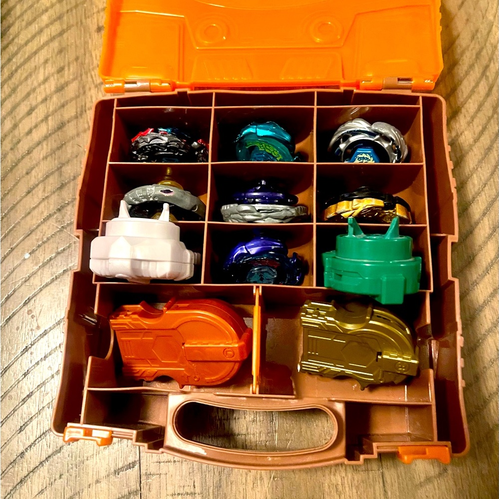 Collectors items! Beyblades and case